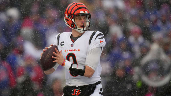 Cincinnati Bengals quarterback Joe Burrow (9) looks to throw in the first quarter during an NFL divisional playoff football game between the Cincinnati Bengals and the Buffalo Bills, Sunday, Jan. 22, 2023, at Highmark Stadium in Orchard Park, N.Y. Cincinnati Bengals At Buffalo Bills Afc Divisional Jan 22 0175
